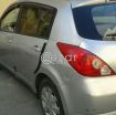 Tida hatchback photo 2