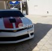 Camaro ss white with orange/red stripes Still under warranty. - صورة 3