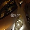 Nissan sunny 2012 (silver) photo 3