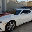 Camaro ss white with orange/red stripes Still under warranty. - صورة 1