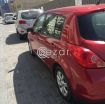 Nissan tiida photo 4