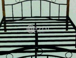 Queen size metal bed with mattress free in Qatar