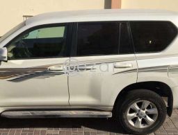 Prado 2010 white for sale in Qatar