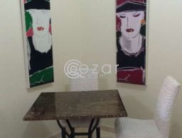 Dining table with 2 chairs for sale in Qatar