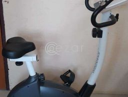 Stationary bike, just 4 month olds - Moving sale in Qatar
