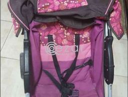 Junior baby stroller in good condition and bed in Qatar