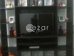 Elegant tv stand with curious for sale in Qatar