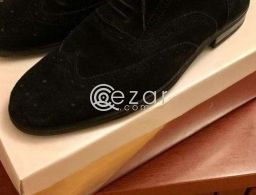 Black wingtip shoes in Qatar