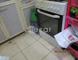 Stove with cylinder and regulator in Qatar