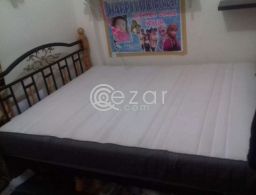 Ikea King size Mattress with bed frame for sale in Qatar