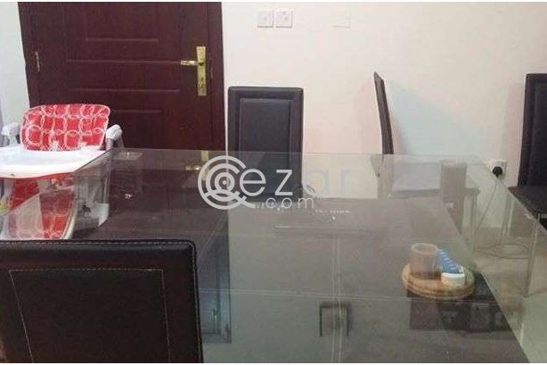 Dining table with eight leather chairs photo 2