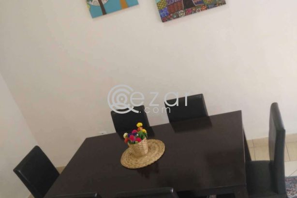 Dining table with 6 leather chairs photo 1