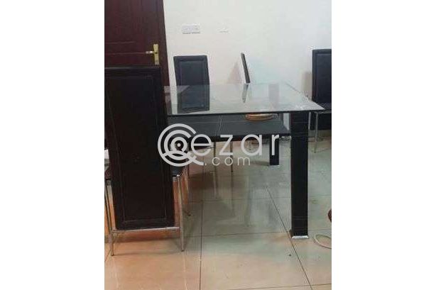 Dining table with eight leather chairs photo 3