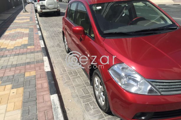 Nissan tiida photo 3