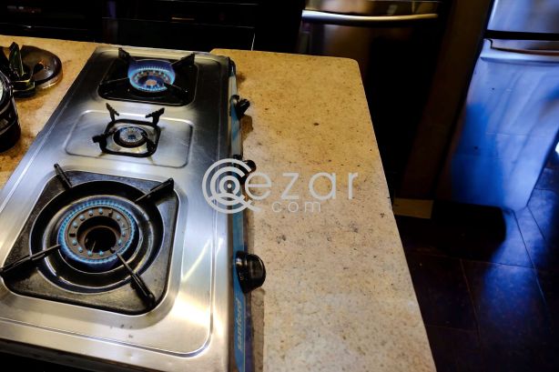 Sanford triple burner auto ignition Gas Stove photo 3