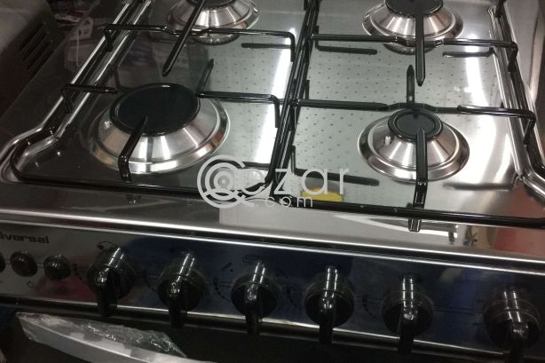 BRAND NEW UNIVERSAL COOKER photo 2