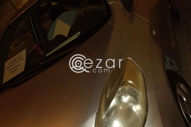 Nissan sunny 2012 (silver) photo 3