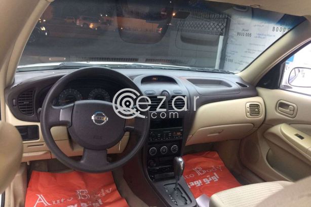 Nissan suny 2012 photo 3