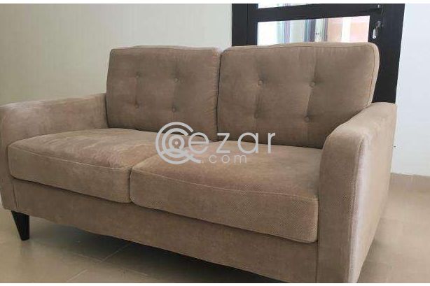 Beige 2 seater sofa photo 1