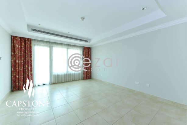 Simply Luxurious Porto Arabia 2BR Apt with Stunning View photo 1