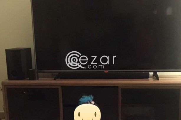 Furniture bed mattress and TV and dining table photo 2