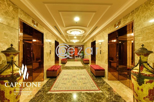 Simply Luxurious Porto Arabia 2BR Apt with Stunning View photo 6