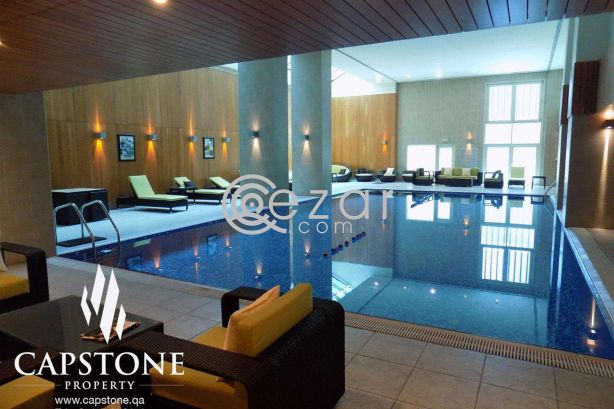 Fully-furnished 3BR plus 1 Maid's Room Apartment in West Bay - صورة %index%