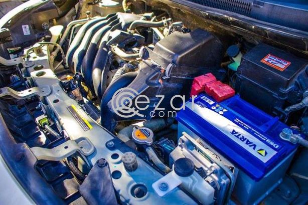 Nissan Suny 2013 photo 2