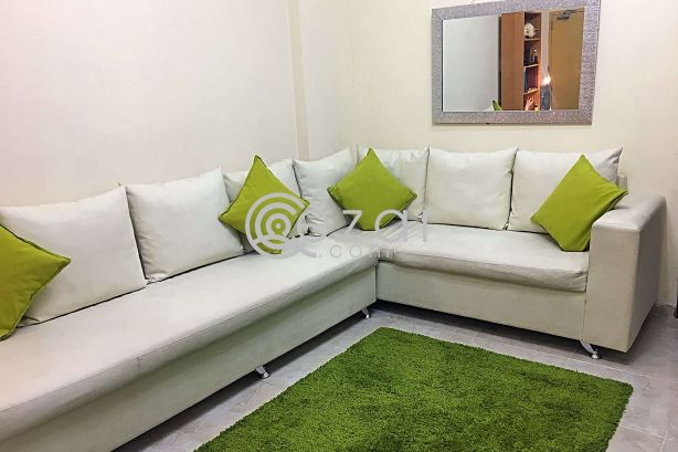 L shape white sofa photo 1