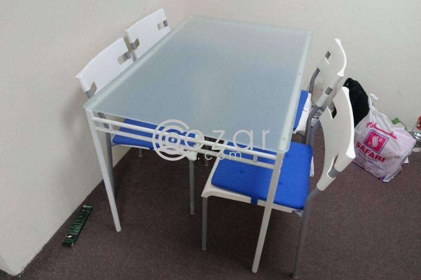 Glass Top Dining Table photo 1