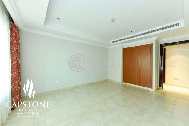 Simply Luxurious Porto Arabia 2BR Apt with Stunning View photo 10