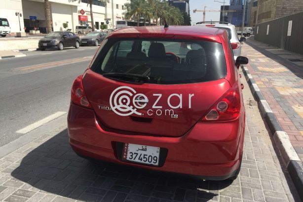 Nissan tiida photo 7