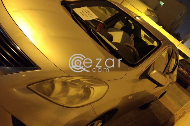 Nissan sunny 2012 (silver) photo 7